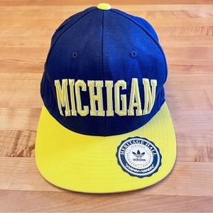 NWT Michigan snapback trucker hat. Adidas Vintage Collegiate Headwear Never worn